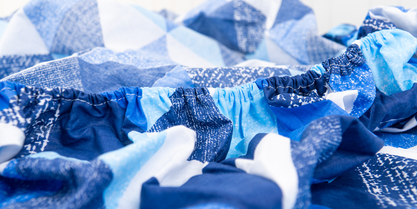 prześcieradło 80x160 trójkąty niebieskie 